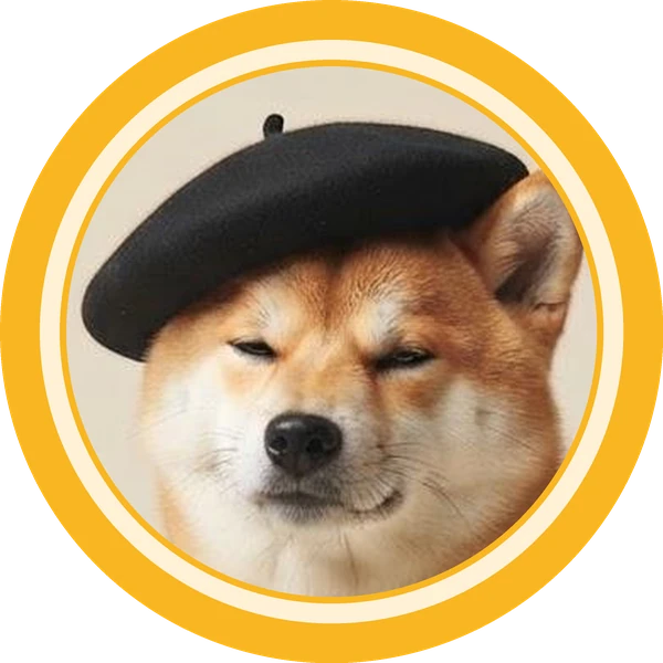 The INUTILE coin: the beret Shiba Inu inside a gold and cream ring.